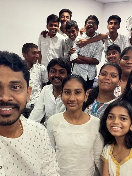 A selfie with another batch of students, all dressed in white for our Navratri celebration.
