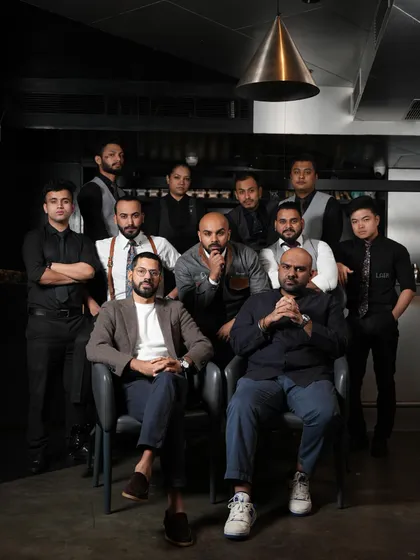 Another portrait of our incredible team. Their collaboration and shared passion are the foundation of the Lair experience.