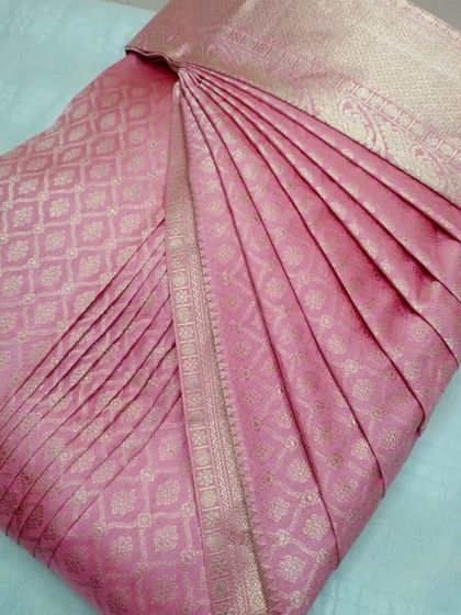 A lovely pastel pink saree, pleated and ready for a client. My service is designed to make you fall in love with wearing sarees again.