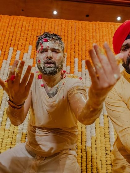 The boys hyping up the groom during the Haldi celebrations. The energy in these moments is absolutely infectious.