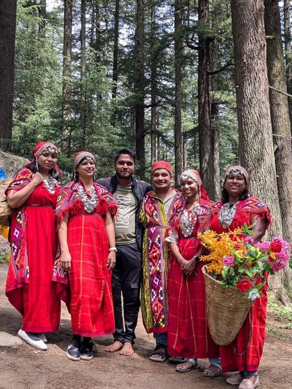 Our travelers trying on traditional Himachali outfits in Manali. It's a fun way to connect with the local culture and get some great photos.