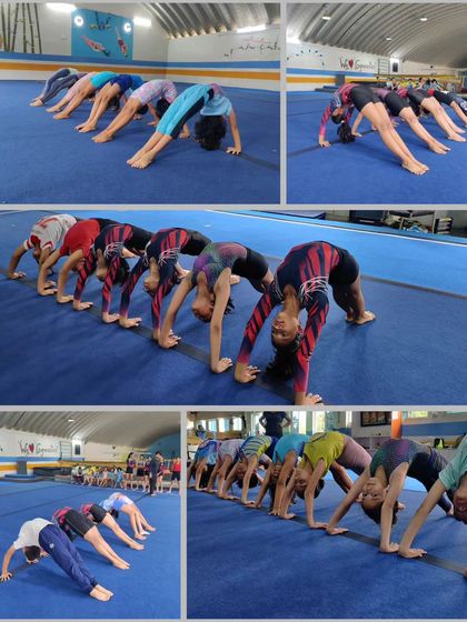 Another view of our gymnasts working on their back bridge flexibility. We focus on creating a strong and supple foundation for all gymnastic movements.