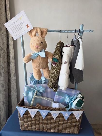 Another shot of the 'Yuvraj' hamper with the clothing rack and bunny.