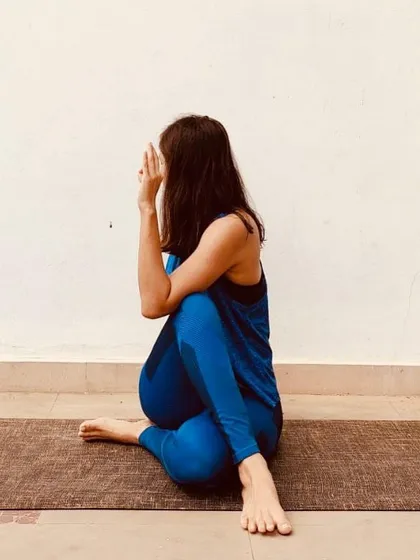 Ardha Matsyendrasana is a seated spinal twist that energizes the spine and stimulates digestion. For beginners, I recommend hugging the thigh instead of trying to bind the arm, to keep the focus on lengthening the spine.