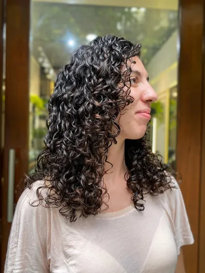 A gallery of my wonderful clients flaunting their unique and beautiful curls. Every curl pattern is different, and I love celebrating them all.
