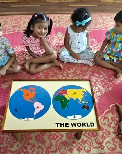 Learning about the world starts with understanding our place in it. A group of children works together with the world map puzzle, sparking curiosity about different continents, cultures, and the interconnectedness of our global family.