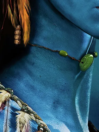 This detail shot focuses on the textures of the necklace and clothing. I enjoyed creating the look of the woven fibers and smooth beads, contrasting with the soft texture of her skin.