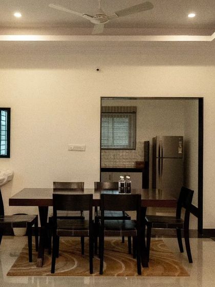 The dining area in a villa, featuring a large table for the whole team to share a meal.