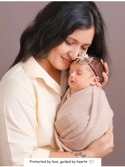 The unbreakable bond between a mother and her newborn. This quiet, gentle moment is a powerful reminder of the love and protection that surrounds your baby from their very first day.