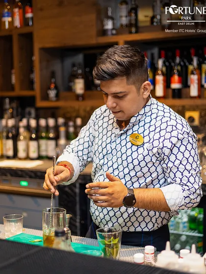 Our bartenders are true craftsmen, meticulously preparing each drink with focus and flair to ensure the perfect balance of flavors.