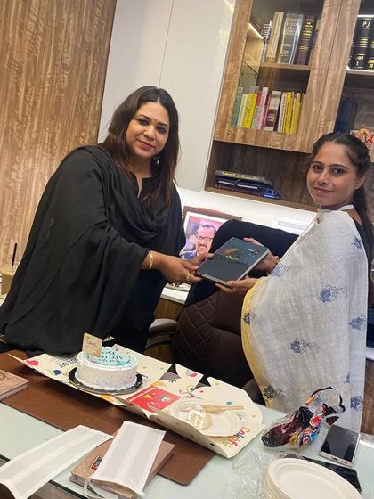 Welcoming a new junior to the profession with her first advocate's band. The whole world opens up to you when you are willing to be a beginner.