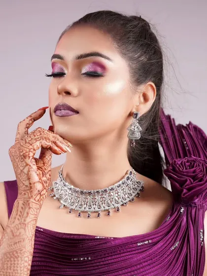 A close-up of the AD choker, showing the intricate design and the sparkle of the stones.