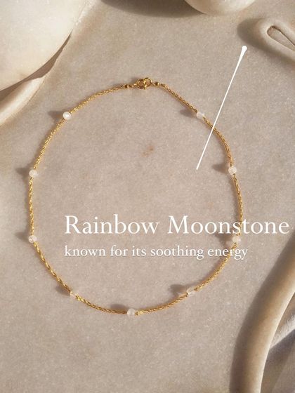 The Rainbow Moonstone ball choker, a piece I designed for its soothing energy and ability to enhance creativity.