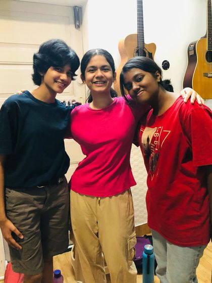 Three of our Western vocal students posing together. The sense of community and shared passion is a huge part of what makes our Gurukul special.