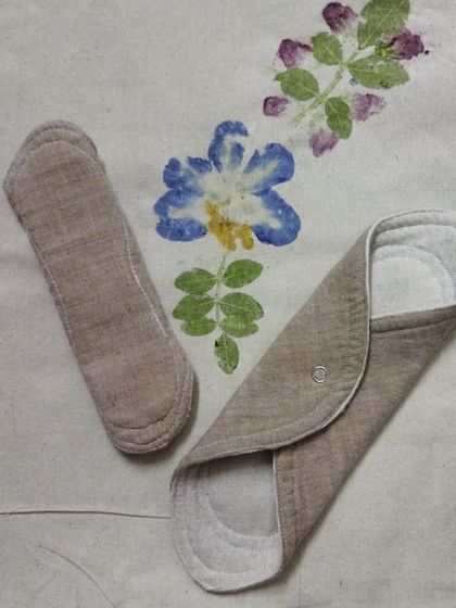 This image showcases panty liners and sanitary pads made from handspun, undyed, and naturally colored cotton. We believe in providing safe and healthy product alternatives for mothers as well.