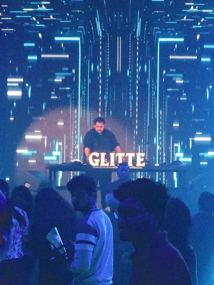A wide shot showing the impressive light production and visuals at Glitte during one of my sets.