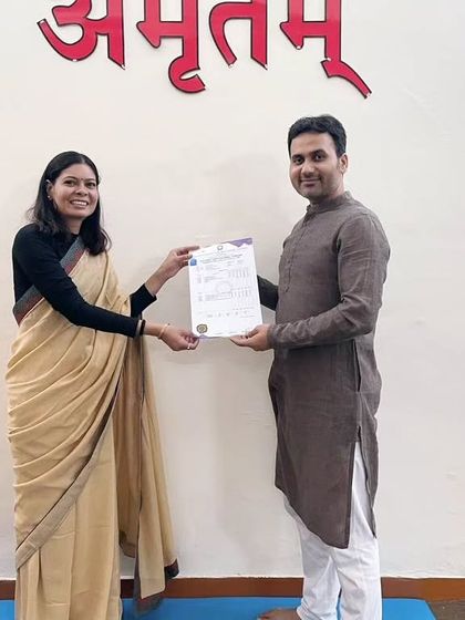 Awarding a 200-hour YTTC certificate to another successful graduate. Her journey is an inspiration to all of us at the foundation.