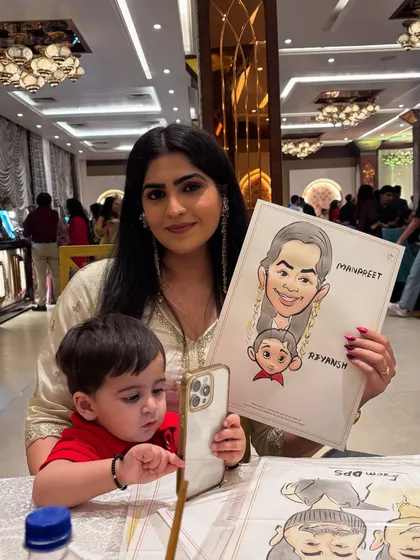 A mother and her baby with their family caricature. I can draw from life or a photo to include even the youngest family members.