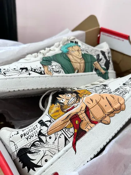 A closer look at the Luffy and Zoro Nike Court Visions. The comic book style is one of my favorites to do. Each shoe features a main character in full color, surrounded by black and white manga scenes, making it feel like a page from the story.