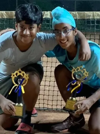 Gurrshan and his partner Tahan Gosain with their trophies after winning the U14 Doubles title of an AITA Championship Series tournament.