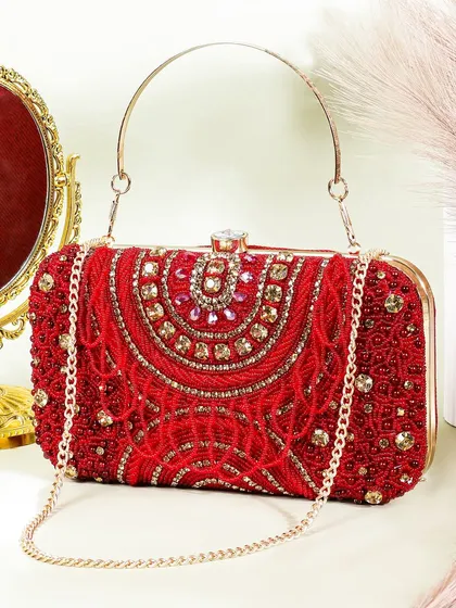 Capturing the fine details of fashion accessories is my specialty. In this shot of a handcrafted bridal clutch, I used careful styling with a mirror and soft textures to highlight the intricate beadwork and luxurious feel, making it perfect for a wedding or special occasion.
