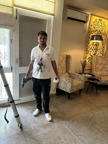 My team arrives ready for a professional installation. Here's one of my technicians with the tools and equipment needed for a CP Plus Full HD camera setup at a home in DLF, Gurgaon.