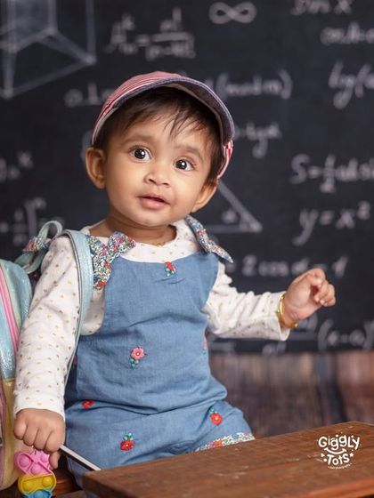 This little teacher is all beauty and brains, ready to make learning fun in our school-themed photoshoot.