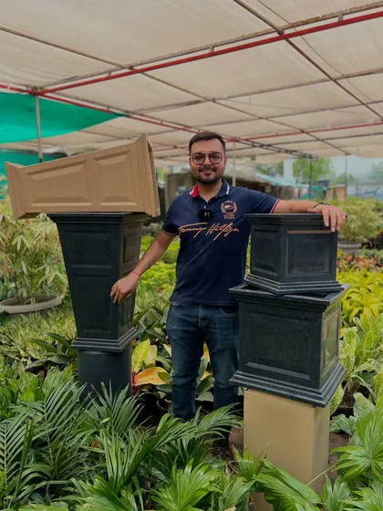 Another view of my tall and stately Tulsi planters. Their height makes them convenient for daily rituals and they serve as a beautiful centerpiece in your garden or home.