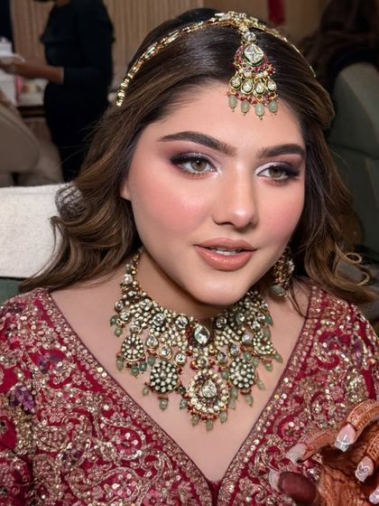 Another angle of this glamorous bridal makeup, showing the beautiful shimmer on the eyelids and the flawless skin.