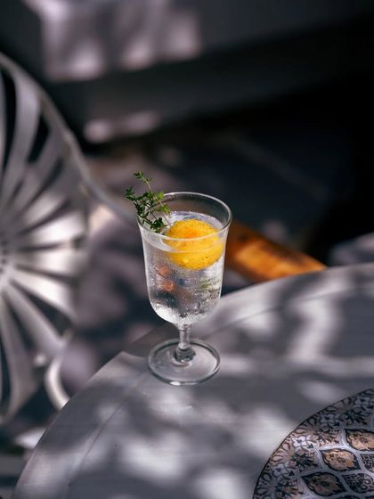 Zen in a glass. This cocktail, crafted with gin, herb syrup, and tonic water, is an elixir meant to help you find clarity and inner peace.