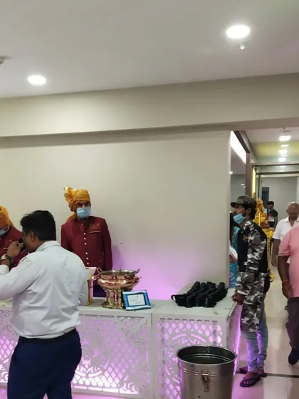 Our staff attending to the buffet at a social gathering. We ensure that the service is smooth and guests can comfortably enjoy their meal.
