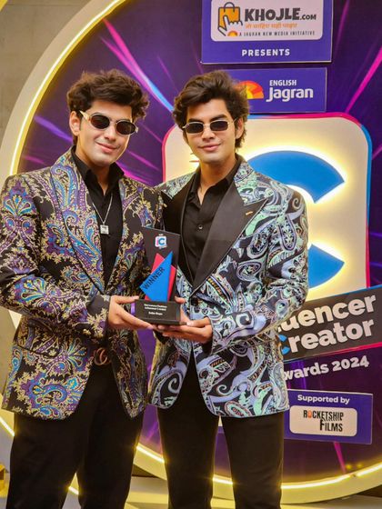 The Sobo Guys wearing our multi-colored printed jackets, featuring peppy colors and classy prints in soft silhouettes.