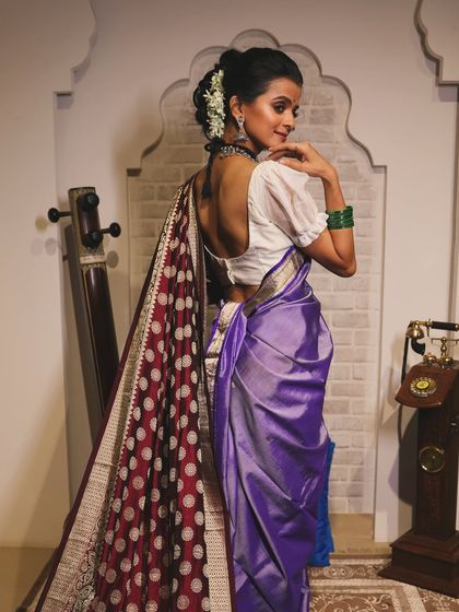 Another angle from the vintage shoot, showing the beautiful puffed-sleeve blouse and the intricate hairstyle.