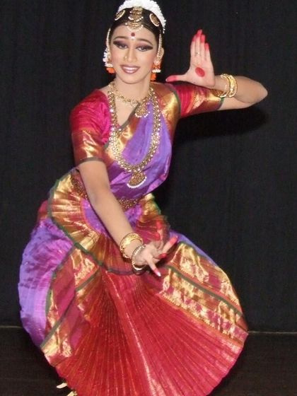 A solo shot from my Arangetram at the age of 14. I remember the practice, the rehearsals, and the feeling of being on stage, all of which I now share with my own students.
