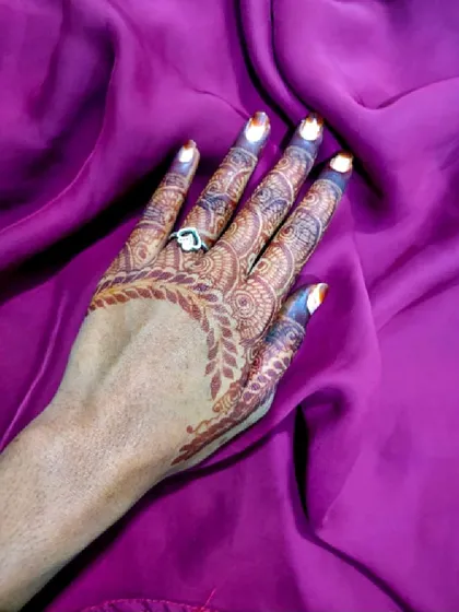 A great example of a matured henna stain. The design is clear, the lines are sharp, and the color is a beautiful deep reddish-brown.