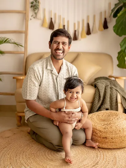 Smiles that spread like butter! The contagious laughter in this father-daughter photo is just so beautiful to see.