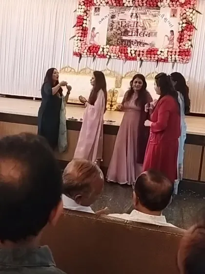 The ladies are all smiles during this interactive balloon game on stage. My goal is to create a space where everyone can let loose and enjoy themselves.