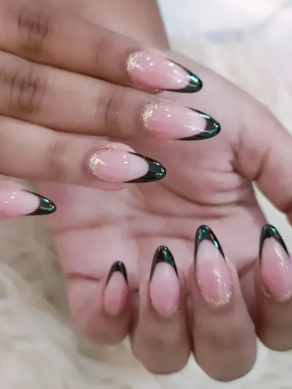 Another angle of the chic black and gold glitter French manicure.