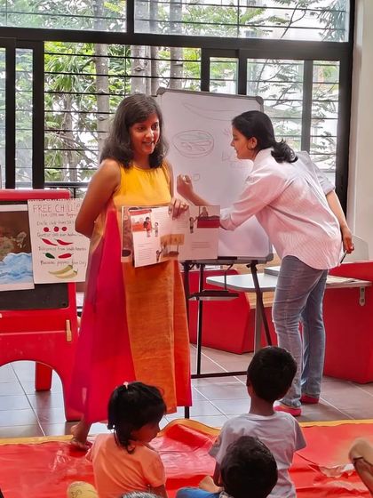 A wide shot of the interactive book launch session, showing both the author and illustrator engaging with the audience.