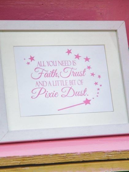 A sweet, framed quote for a fairy-themed party. Small decorative signs like this help reinforce the theme and add a touch of magic to the space.