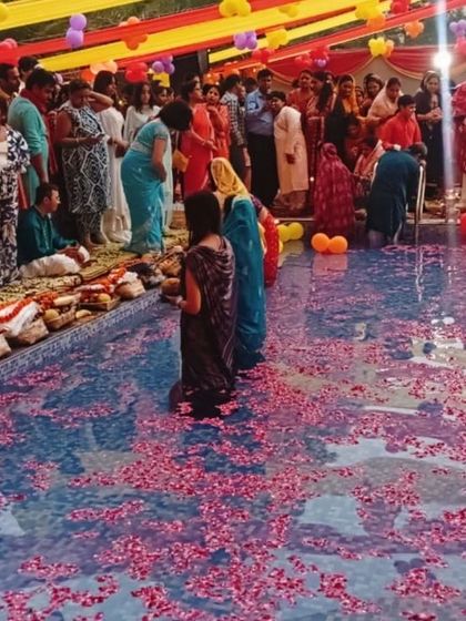 Devotees performing rituals during the Chhath Pooja celebrations at Saya Gold Avenue. We are proud to facilitate such important cultural events for our residents.