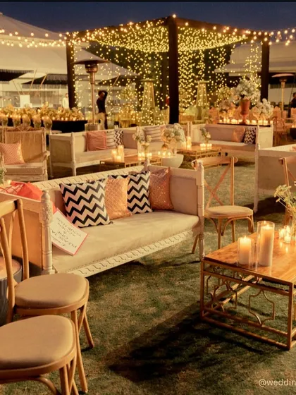 This sangeet was designed for presence, not just performance. We used vintage-style seating, hundreds of candles, and a warm, neutral palette to create quiet corners for laughter and conversation, letting the people and their connections shine.