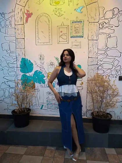 A full denim look styled for a cafe visit. I paired a denim skirt with a layered denim and white vest. It's a great example of how to do denim-on-denim in a fresh and modern way.
