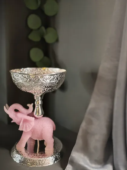 Crafted in carved rose quartz and detailed silver-toned metal, these elephant bowls are equal parts charm and utility. The pink elephant base adds a playful and luxurious touch.