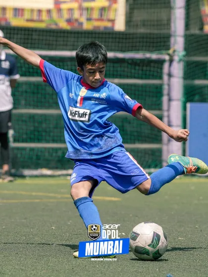 The focus and determination of our young players in action during a competitive match. We provide year-round opportunities for our players to test their skills in high-stakes environments, which is crucial for their technical and tactical refinement.