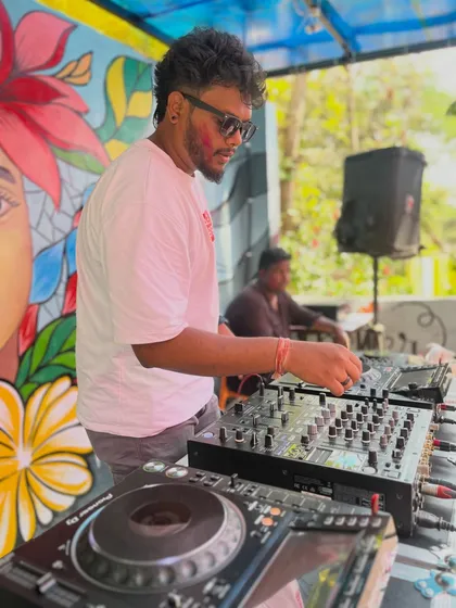 Mixing tracks at an outdoor Holi party in Davangere. I love daytime events where the sun is out and the colors are as vibrant as the electronic and pop music I'm playing.