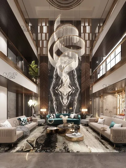We believe in making a grand statement. This triple-height living room is designed to inspire awe, with a magnificent cascading chandelier that draws the eye upwards and book-matched marble that creates a stunning focal point, showcasing our expertise in large-scale luxury design.