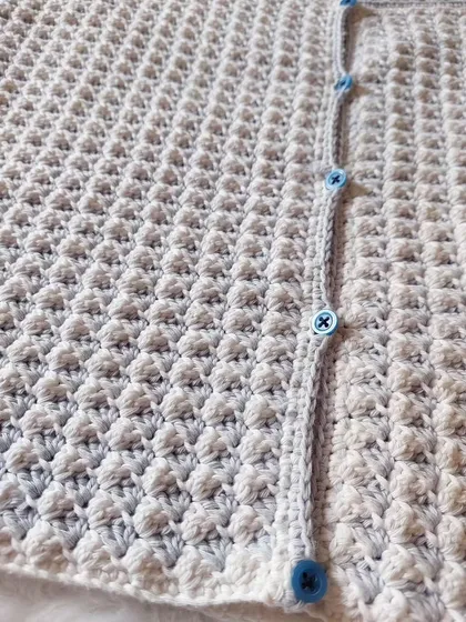 Another detailed shot of the intricate stitchwork that gives this CoCo Jacket its unique texture.