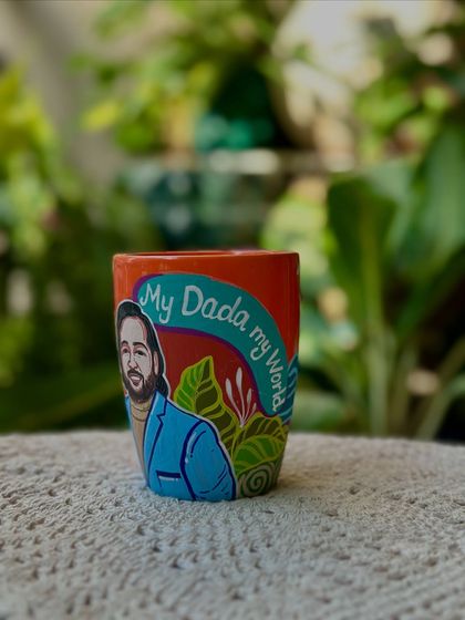 "My Dada, My World." A heartfelt message on a custom portrait mug for Father's Day.