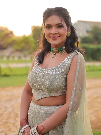 A close-up of my look for my brother's engagement. The heavily embellished blouse is balanced with a simple green choker, and the soft makeup lets the outfit shine.